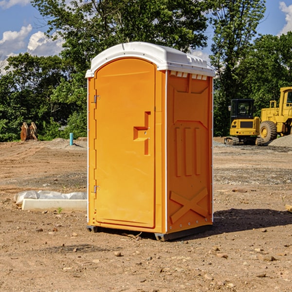 how often are the portable restrooms cleaned and serviced during a rental period in Hugo